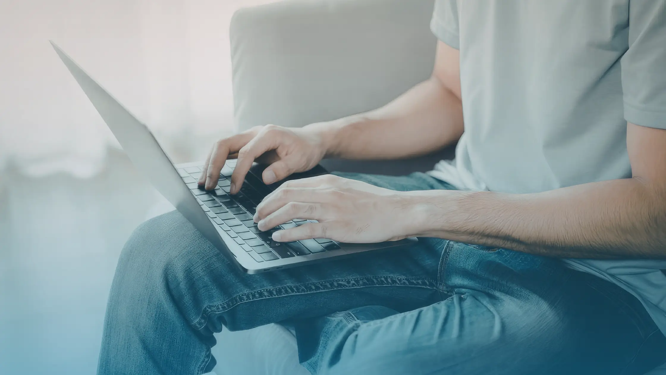 Man using a laptop to request a Modafinil prescription online through a licensed U.S. telehealth platform