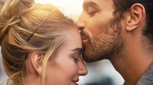 Couple representing improved confidence and intimacy through sexual health treatment